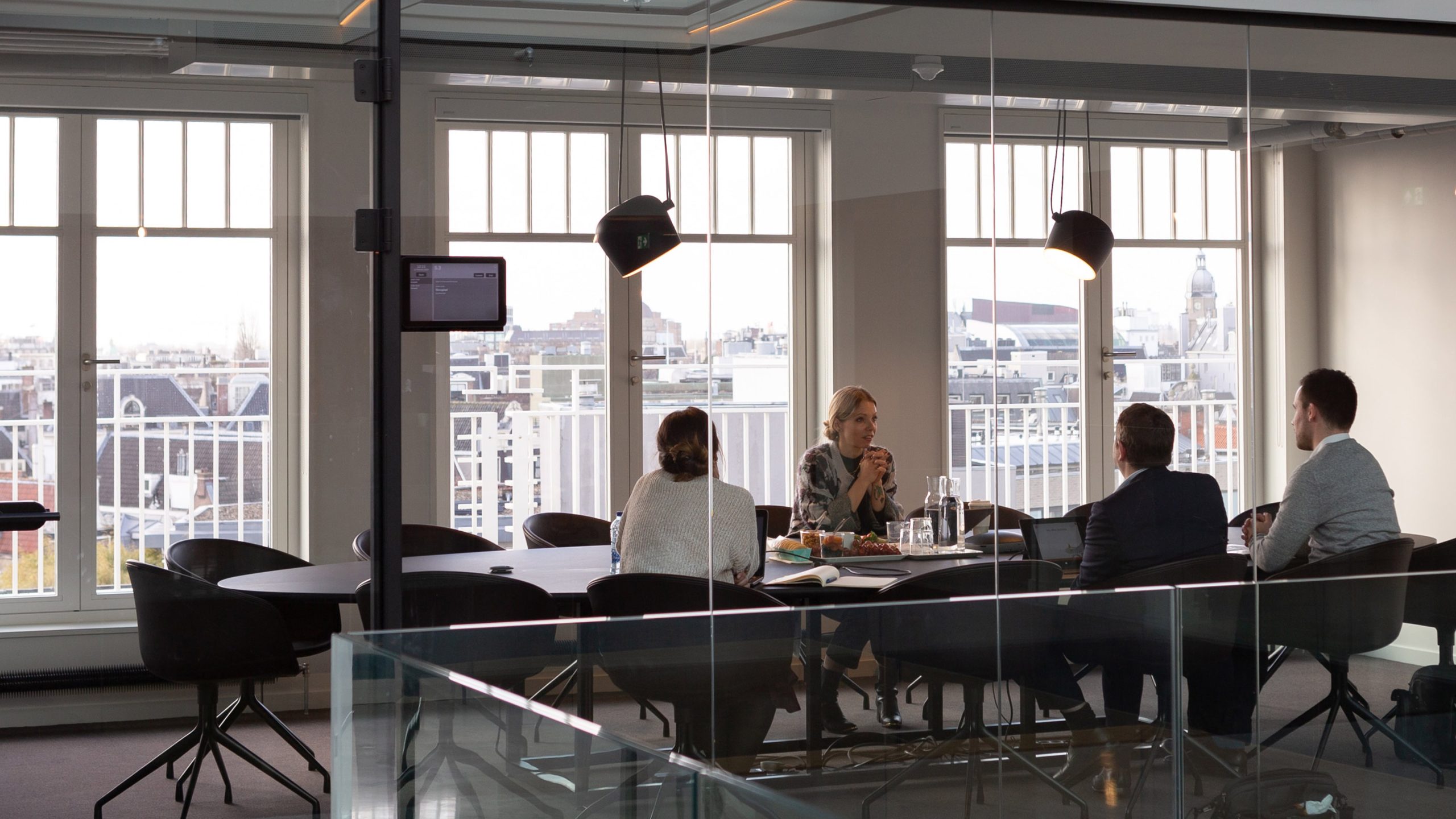 People around meeting table